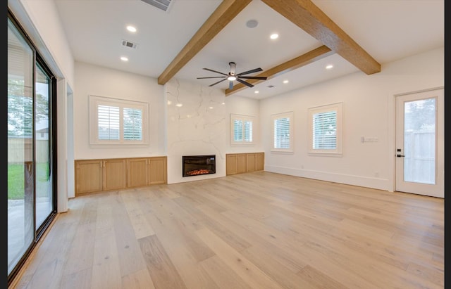 3909 Ella Blvd, Houston, TX 77018 - unfurnished living room with beam ceiling, light wood-style flooring, a fireplace, ceiling fan, and recessed lighting