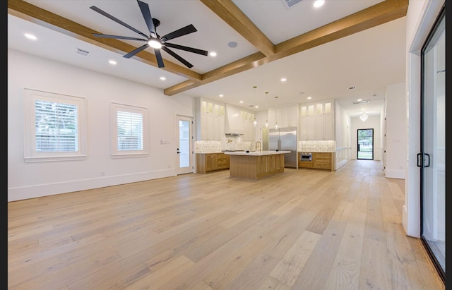 3909 Ella Blvd, Houston, TX 77018 - unfurnished living room featuring beamed ceiling, ceiling fan, light wood finished floors, and recessed lighting
