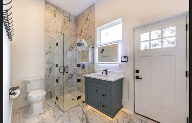 3909 Ella Blvd, Houston, TX 77018 - bathroom with marble look tiles, vanity, and a marble finish shower