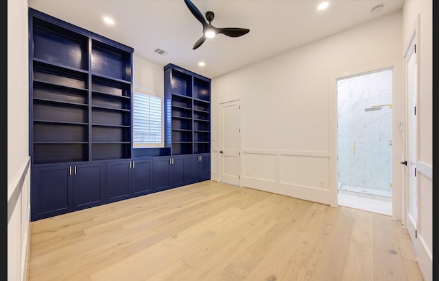 3909 Ella Blvd, Houston, TX 77018 - unfurnished room with light wood-style floors, a decorative wall, ceiling fan, a wainscoted wall, and recessed lighting