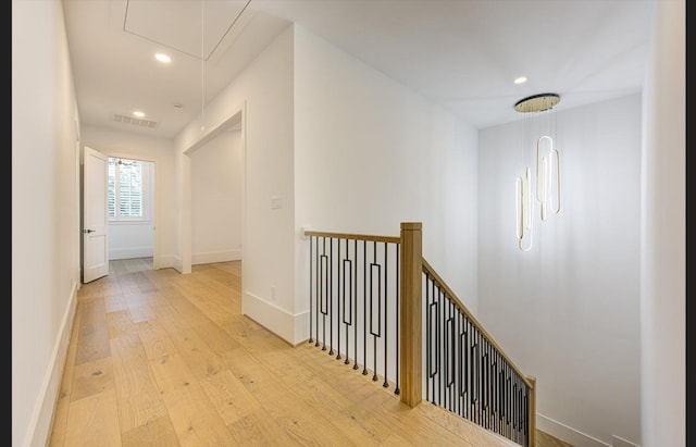 3909 Ella Blvd, Houston, TX 77018 - hallway with attic access, wood-type flooring, an upstairs landing, and recessed lighting