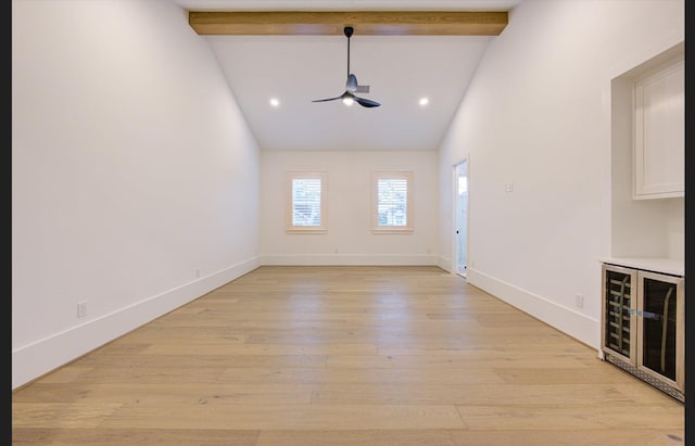3909 Ella Blvd, Houston, TX 77018 - spare room featuring ceiling fan, wine cooler, beamed ceiling, light wood-style flooring, and high vaulted ceiling