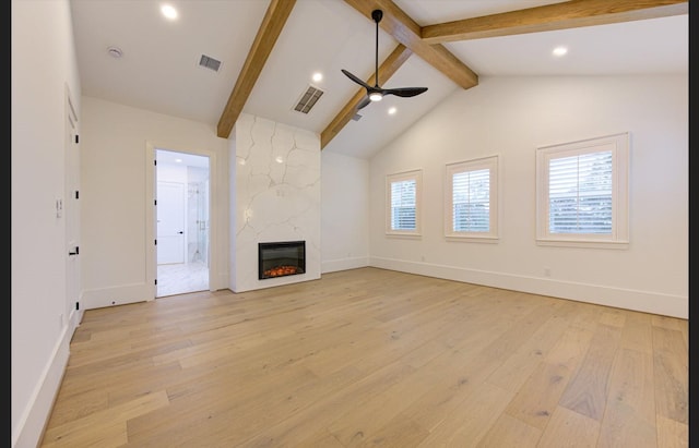 3909 Ella Blvd, Houston, TX 77018 - unfurnished living room featuring light wood-style floors, a ceiling fan, a premium fireplace, and recessed lighting