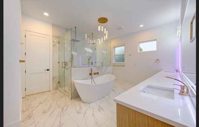 3909 Ella Blvd, Houston, TX 77018 - bathroom with a marble finish shower, marble look tiles, a freestanding bath, double vanity, and recessed lighting