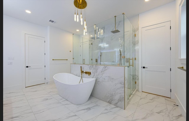 3909 Ella Blvd, Houston, TX 77018 - full bathroom featuring marble finish floors, a marble finish shower, a freestanding tub, and recessed lighting