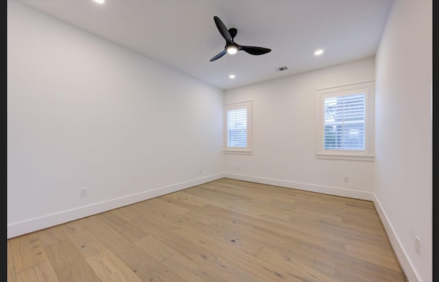 3909 Ella Blvd, Houston, TX 77018 - spare room with plenty of natural light, light wood-style floors, ceiling fan, and recessed lighting