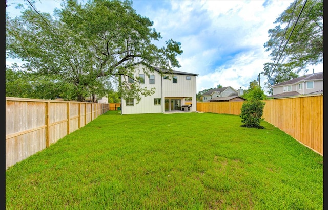 3909 Ella Blvd, Houston, TX 77018 - rear view of house with a fenced backyard and a patio
