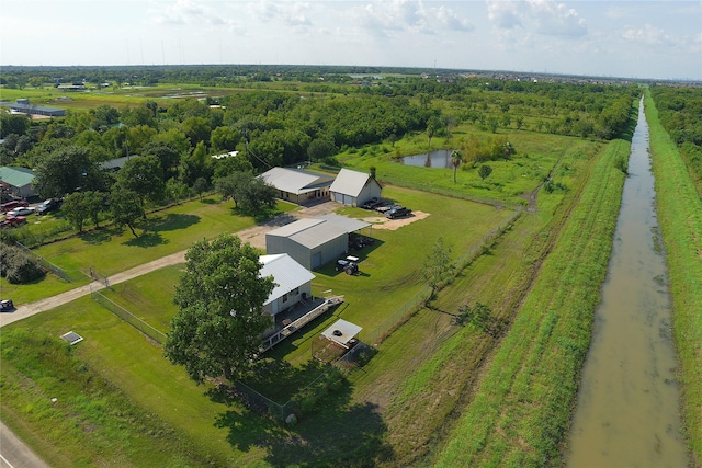 drone / aerial view featuring a rural view and a water view