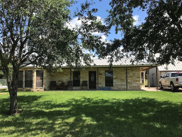 view of front of house with a front lawn