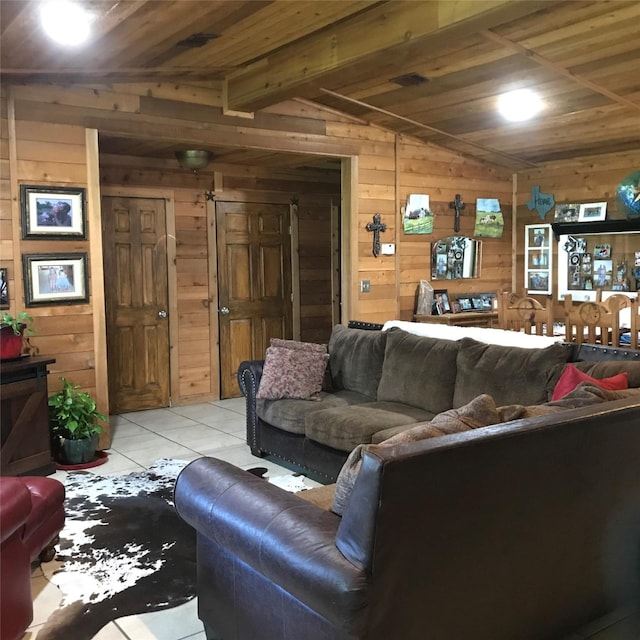 living room featuring light tile floors, wooden walls, vaulted ceiling, and wooden ceiling