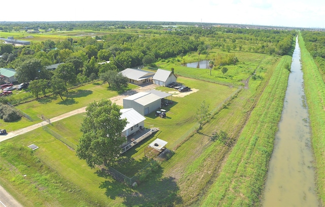 drone / aerial view featuring a rural view and a water view