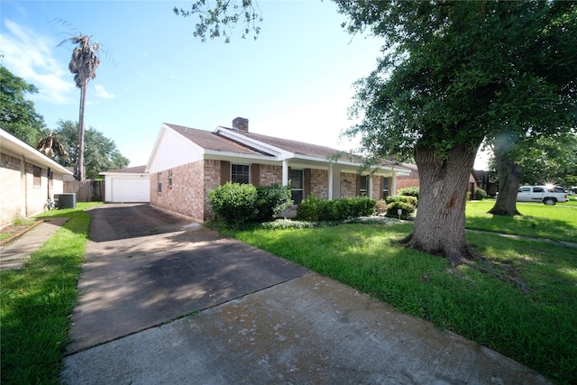 single story home featuring central AC unit and a front lawn