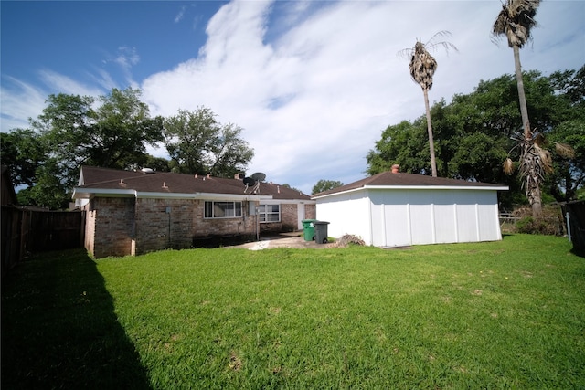 view of yard with a storage shed