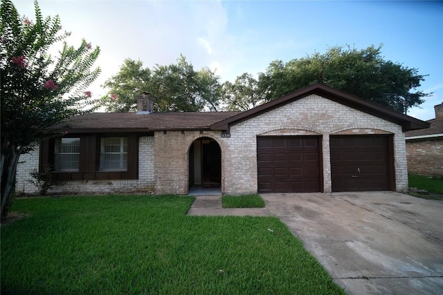 ranch-style house with a front yard and a garage