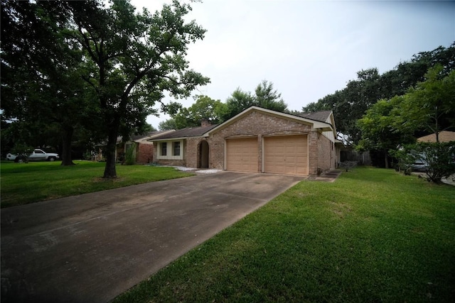 ranch-style home featuring a front yard and a garage