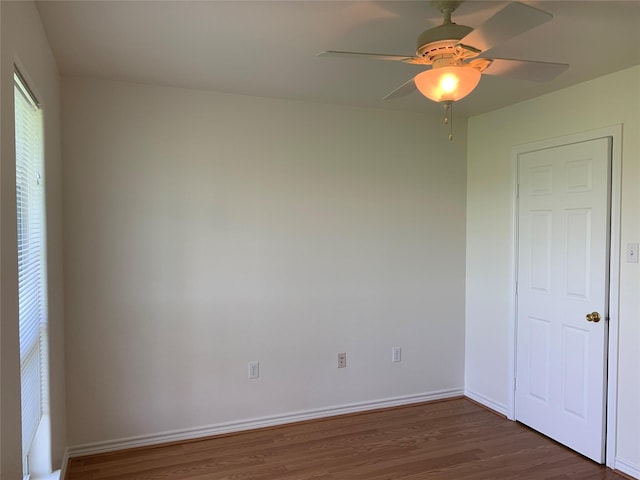 unfurnished bedroom featuring ceiling fan and hardwood / wood-style flooring