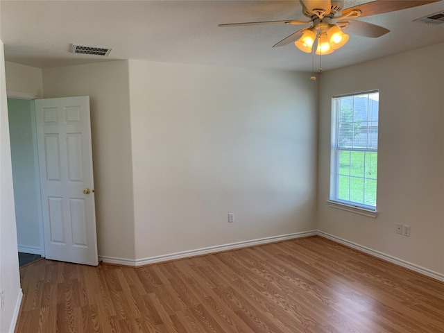 unfurnished room featuring wood-type flooring and ceiling fan