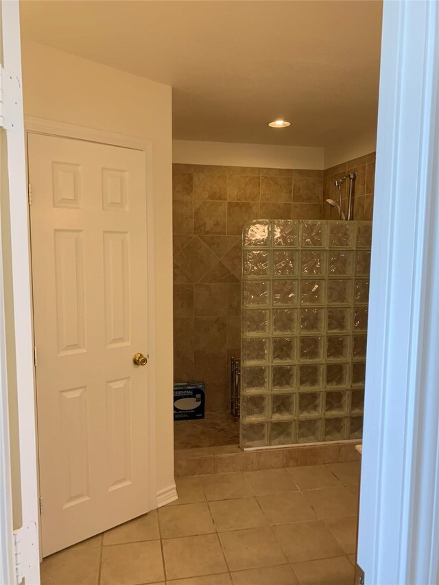 bathroom featuring tile floors