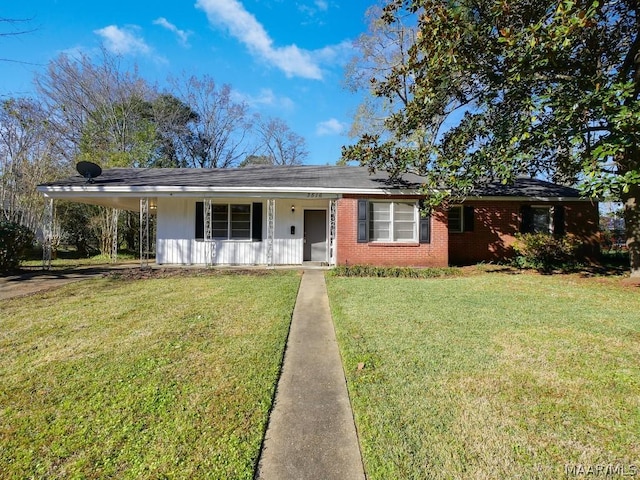 single story home with a porch and a front yard