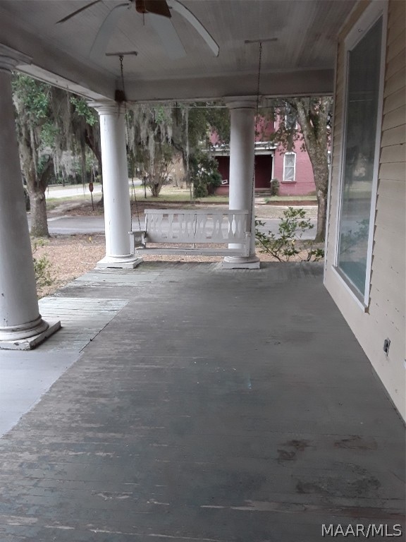 view of patio featuring ceiling fan