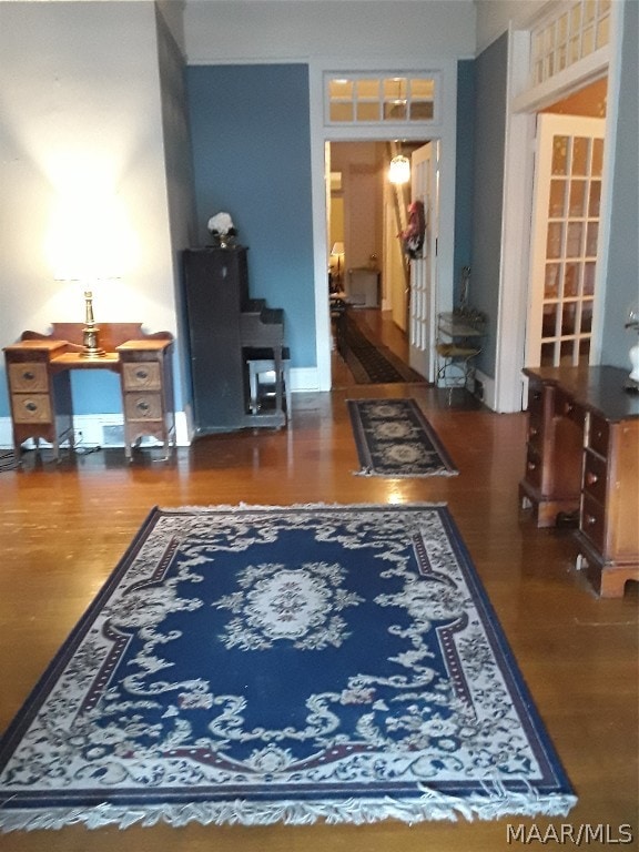 living room featuring dark hardwood / wood-style floors