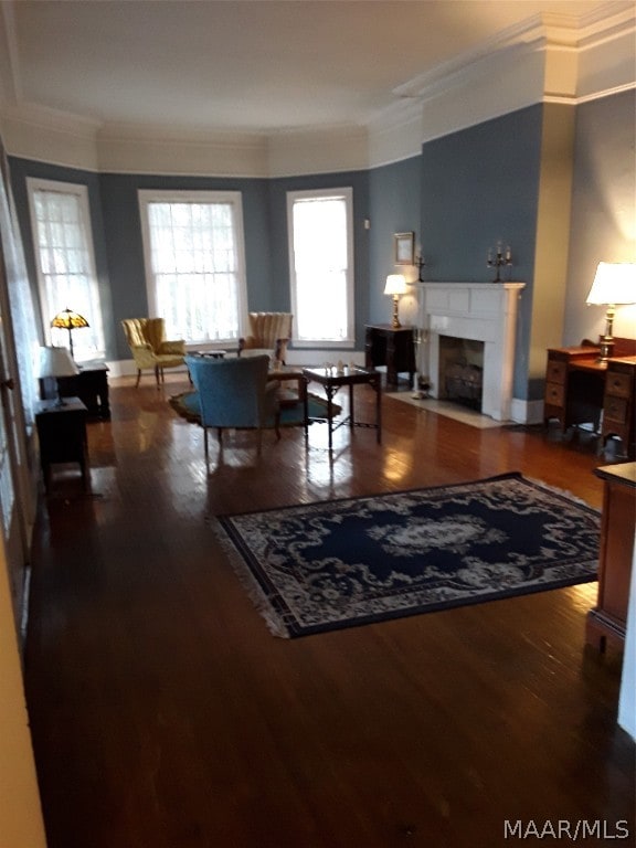 living room featuring ornamental molding and hardwood / wood-style flooring
