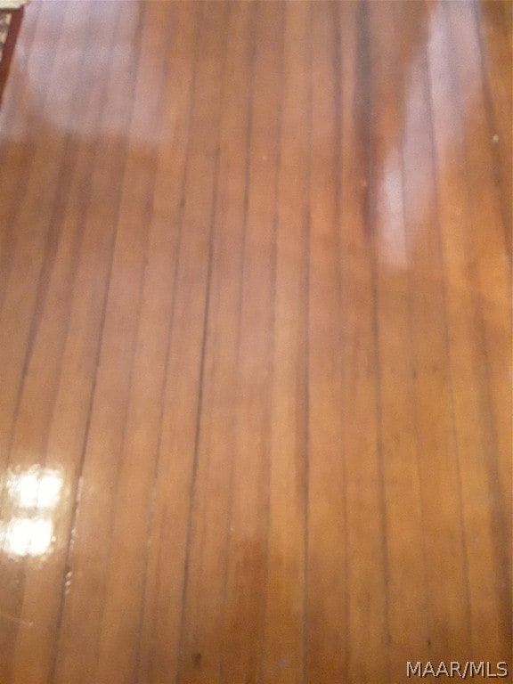interior details featuring hardwood / wood-style floors