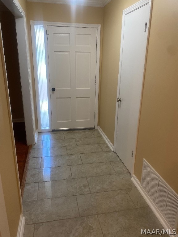 foyer featuring light tile floors