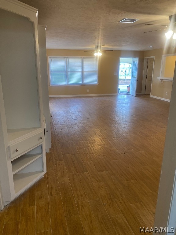 hall with hardwood / wood-style flooring