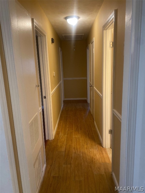 hallway featuring light wood-type flooring