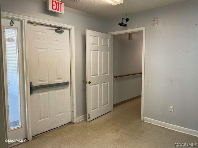 unfurnished bedroom featuring light tile flooring