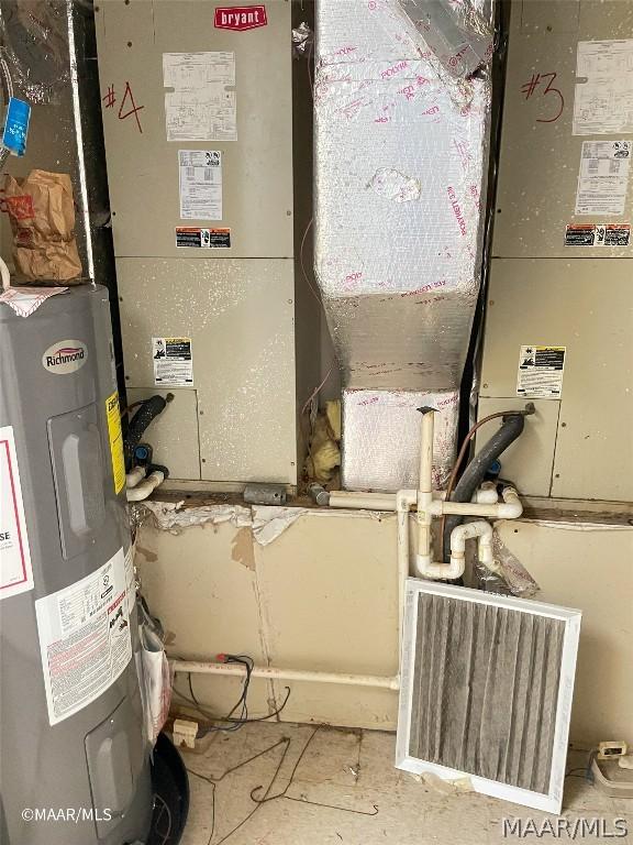 utility room with water heater