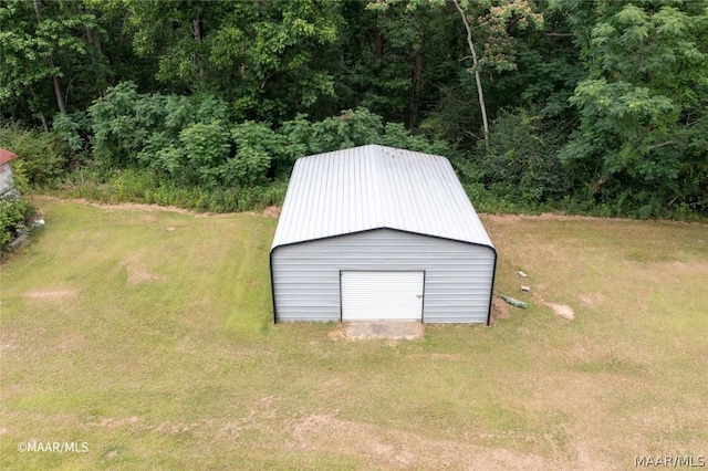 view of shed / structure with a lawn