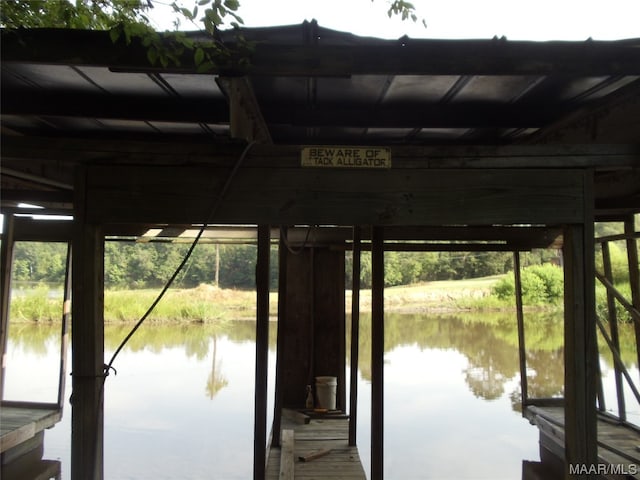 dock area featuring a water view