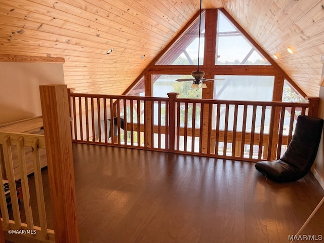 additional living space featuring dark hardwood / wood-style flooring, ceiling fan, wood ceiling, and vaulted ceiling