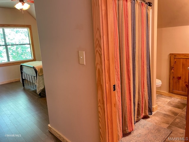 hallway featuring tile floors