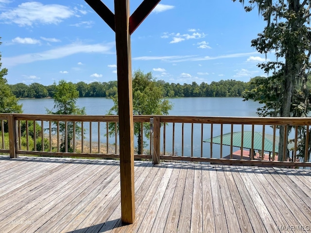 deck featuring a water view