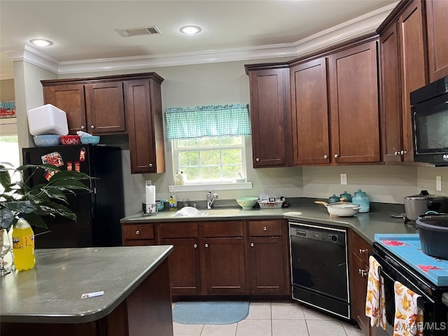 kitchen with crown molding, sink, light tile patterned floors, and black appliances