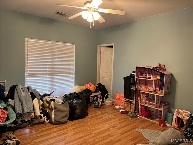 game room featuring ceiling fan and light hardwood / wood-style floors