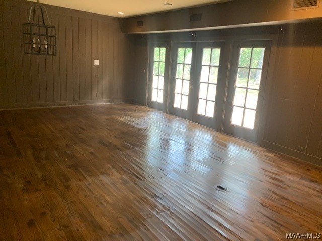 empty room featuring dark hardwood / wood-style flooring