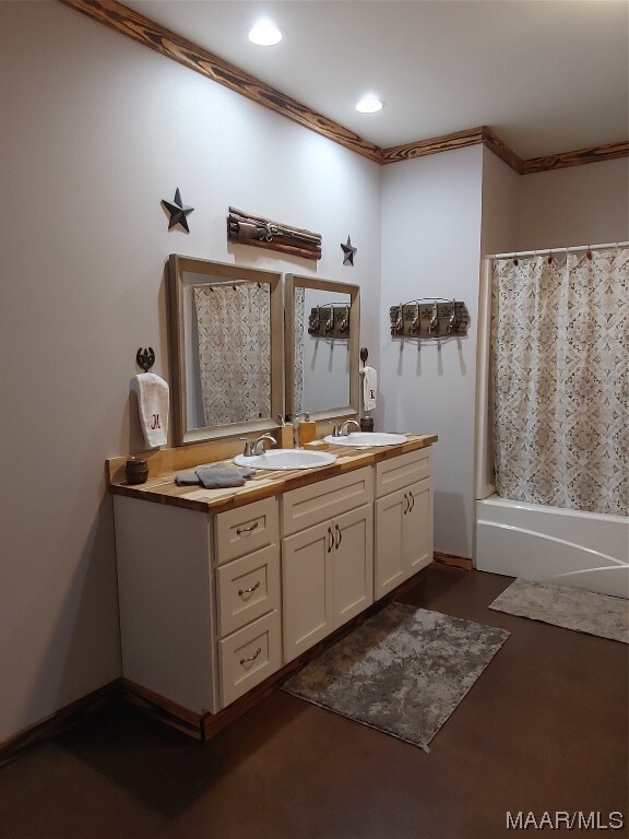 115 County Road 489th Rd, Verbena, AL 36091 - bathroom featuring crown molding, double vanity, and shower / bathtub combination with curtain