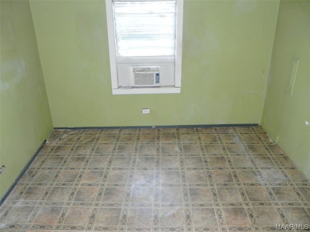 empty room with tile floors