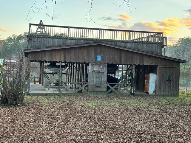 view of outdoor structure at dusk