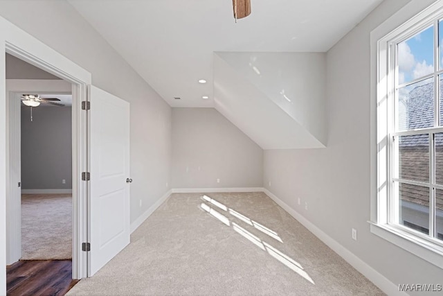 bonus room featuring vaulted ceiling, ceiling fan, and carpet