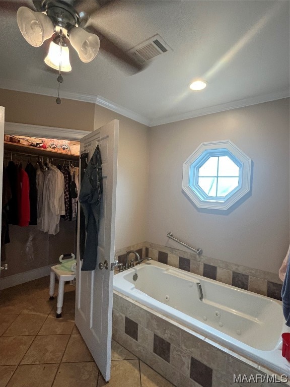 bathroom with a relaxing tiled bath, tile flooring, ceiling fan, and ornamental molding