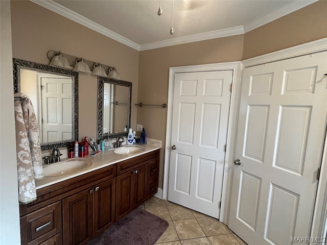 bathroom featuring dual sinks, ornamental molding, tile floors, and vanity with extensive cabinet space