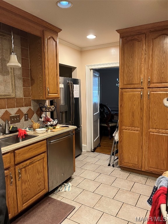 kitchen with refrigerator with ice dispenser, sink, dishwasher, backsplash, and light tile flooring