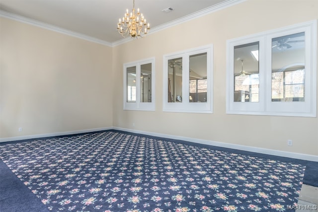 carpeted empty room with ornamental molding and an inviting chandelier