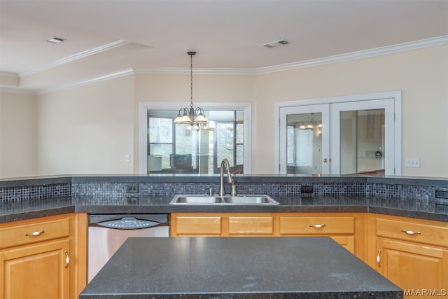 kitchen with sink, stainless steel dishwasher, and crown molding