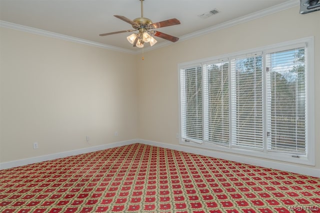 empty room with plenty of natural light, ceiling fan, and crown molding